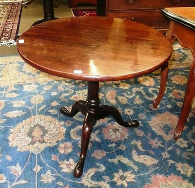 Lot 560 - A Georgian mahogany tripod table