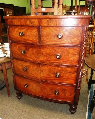 Lot 565 - Victorian mahogany and walnut bow fronted four height chest of drawers