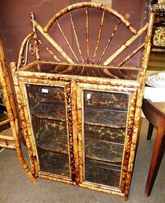 Lot 572 - Late Victorian Aesthetic bamboo dwarf cabinet with fan-shaped back