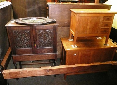 Lot 595 - An oak cabinet on stand, an oak framed mirror and two oak blanket boxes