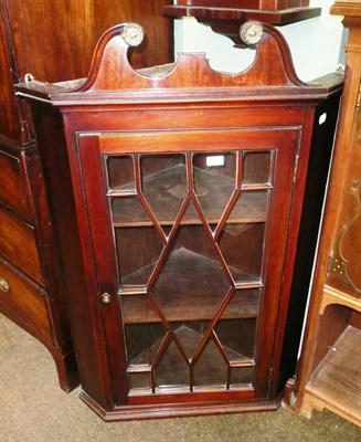 Lot 599 - Georgian glazed corner cupboard