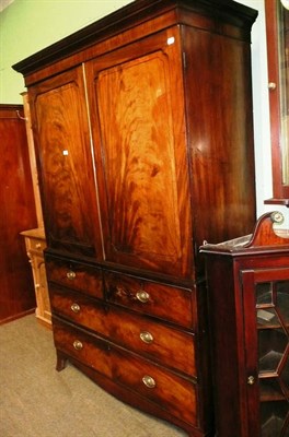 Lot 601 - Georgian mahogany linen press