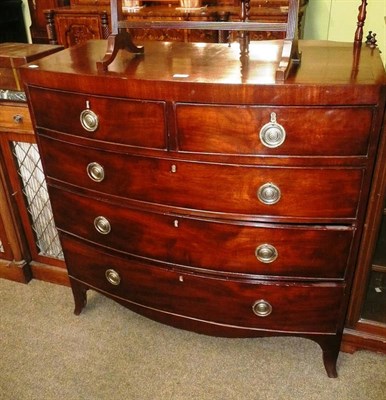 Lot 611 - Early 19th century mahogany bow fronted chest of drawers