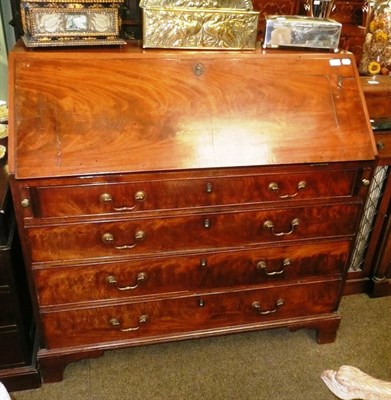 Lot 613 - A Georgian mahogany bureau