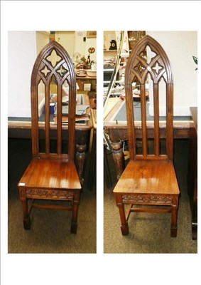 Lot 630 - Pair of oak hall chairs