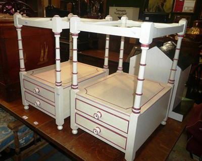 Lot 737 - Pair of cream and red painted bedside tables with glass protectors