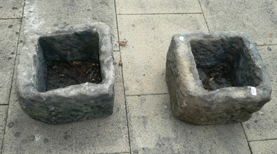 Lot 808 - A pair of square stone planters