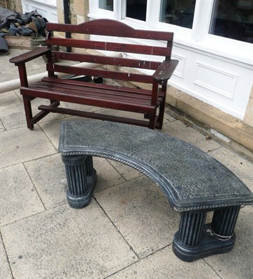 Lot 810 - A composition stone bench and a wooden garden bench