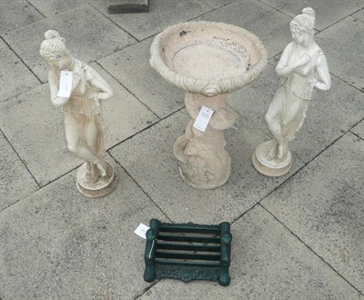 Lot 814 - Two composition garden statues, a bird bath and a boot scraper