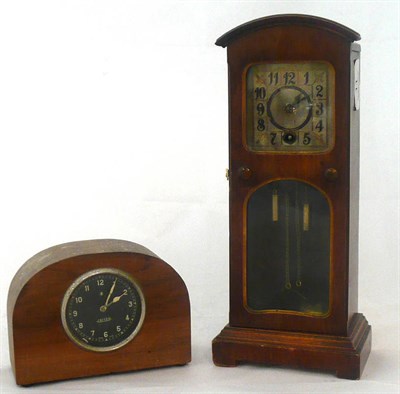Lot 11 - An Art Nouveau miniature longcase and a Jaeger clock