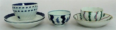 Lot 19 - A Chelsea Derby tea bowl and saucer, two Worcester tea bowls and saucers (a.f.) and a Worcester tea