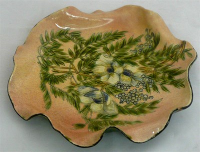 Lot 30 - A Linthorpe pottery dish, shape No.1469, with fluted edge, painted by Clara Pringle with...