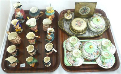 Lot 48 - Quantity of assorted character jugs, two Maling lustre trinket sets and a petit point dressing...