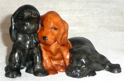Lot 73 - A Royal Worcester Spaniel and puppies