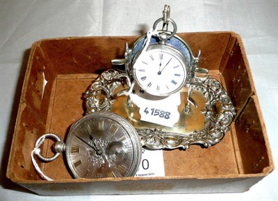 Lot 110 - Silver cased key wind pocket watch, silver fob watch and a plated watch holder