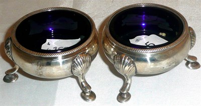 Lot 115 - A pair of George III silver cauldron salts