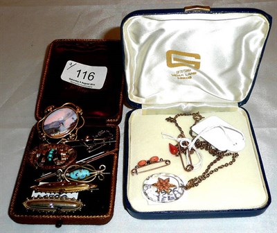 Lot 116 - A coral set pendant, two coral brooches and assorted other brooches