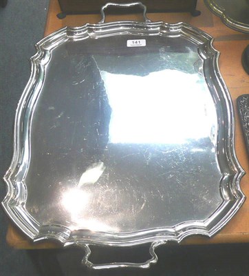 Lot 141 - A large silver two-handled tray, 88oz