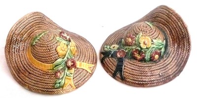 Lot 151 - A pair of majolica wall pockets modelled as hats
