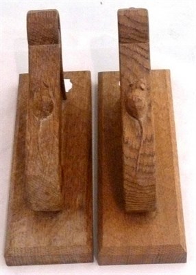 Lot 159 - Two Mouseman wall lamp brackets