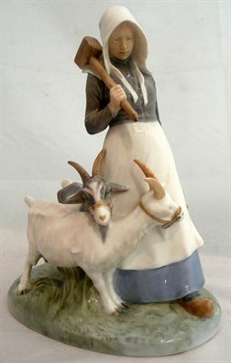 Lot 169 - Royal Copenhagen figure of a girl with two goats, model number 694