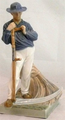 Lot 170 - Royal Copenhagen figure of a farm worker holding a scythe, model number 685