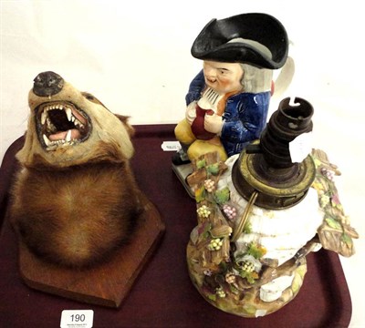 Lot 190 - Continental lamp base, Staffordshire toby jug, taxidermy Badger head on wooden shield