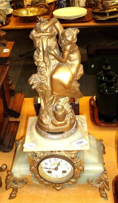 Lot 194 - An onyx mantel clock with gilt metal lady figure