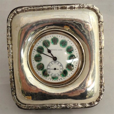 Lot 207 - A plated pocket watch in a silver mounted case