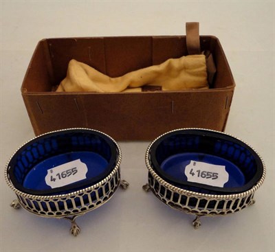 Lot 218 - A pair of silver salts with blue glass liners