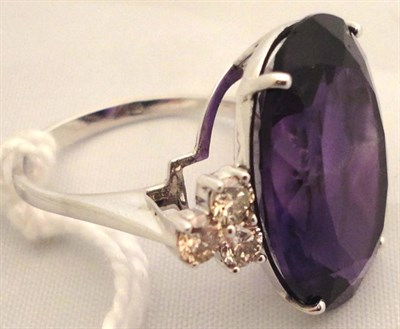 Lot 234 - 14ct white gold amethyst and diamond ring