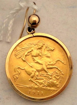 Lot 236 - A 1911 half sovereign loose mounted as an earring