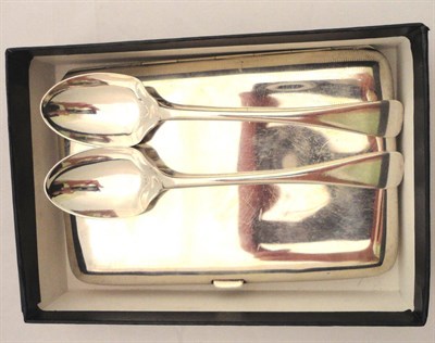 Lot 253 - A silver cigarette case and two teaspoons