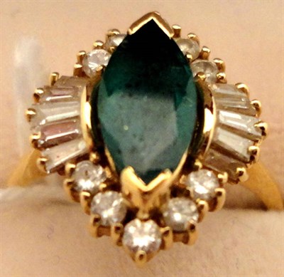 Lot 258 - An emerald and diamond ring