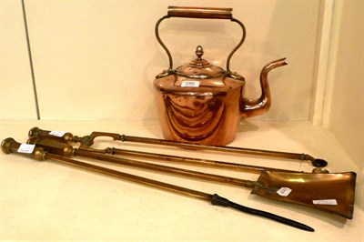 Lot 288 - Three brass fire irons and a copper kettle