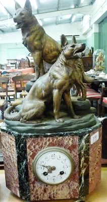 Lot 316 - An Art Deco marble mantel clock mounted with a spelter group of two Alsatians