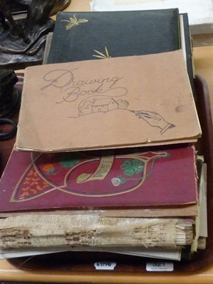 Lot 321 - Four albums of assorted postcards and photographs, two sketchbooks, loose photographs etc