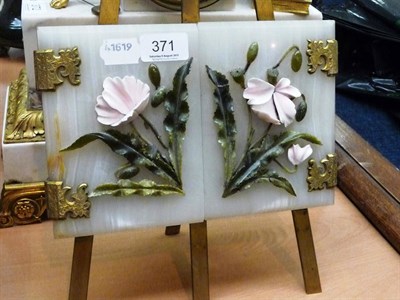 Lot 371 - Gilt metal double photograph frame on easel mount with onyx hinged doors decorated with flowers