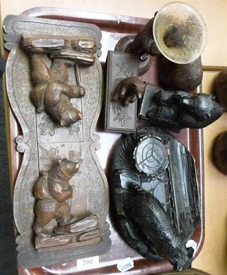 Lot 386 - Six items of black forest carved bears including folding book stand and inkwell, blotter etc