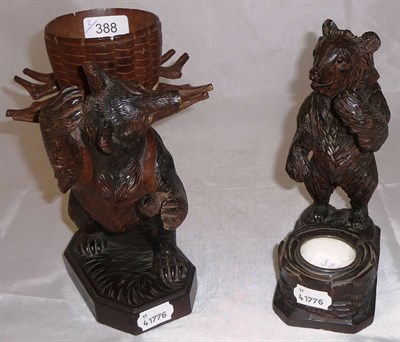 Lot 388 - Black forest carved bear pipe holder and a similar pipe stand