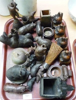 Lot 391 - A tray of assorted carved black forest bears including hand bells, ashtray, wall mounted pipe...