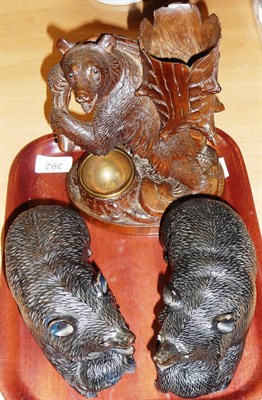 Lot 392 - Two similar carved black forest bears and cubs and a standing bear pipe holder