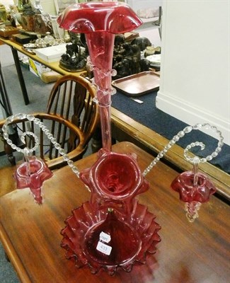 Lot 433 - A Victorian cranberry glass epergne with two baskets (one branch missing)