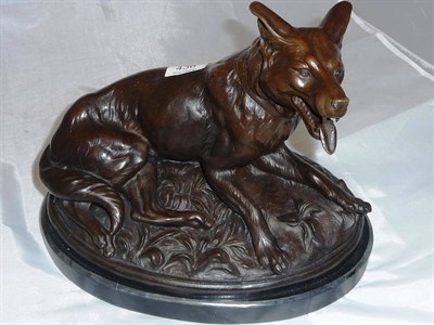 Lot 436 - A bronzed figure of a German Shepherd dog