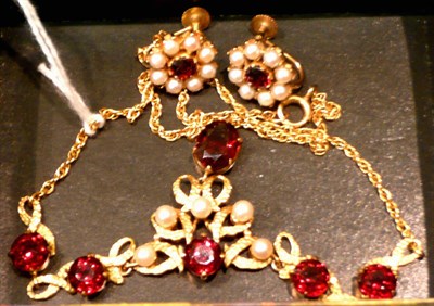 Lot 438 - A 9ct gold necklace and earrings set with garnets and cultured pearls