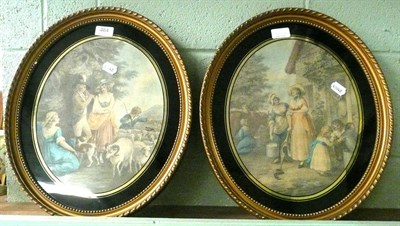 Lot 464 - A pair of gilt framed oval coloured mezzotints of a milkmaid and shepherdess