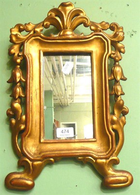 Lot 474 - Small carved gilt framed wall mirror