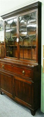 Lot 511 - A Regency mahogany secretaire bookcase