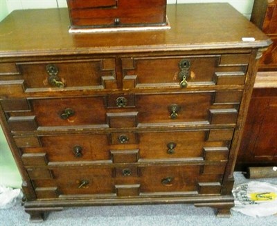 Lot 516 - Oak moulded front chest of drawers