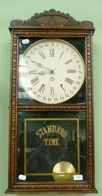 Lot 519 - American New Haven clock company wall clock with pendulum